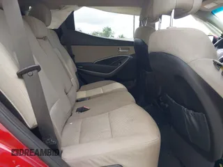 2016 Hyundai Santa Fe z VIN 5XYZT3LB1GG321854, wystawiony jako IAAI lot #40244942 z przebiegiem Nie podano mil oraz . Historia ofert i sprzedaży dostępna na DreamBid. Obrazek 8.