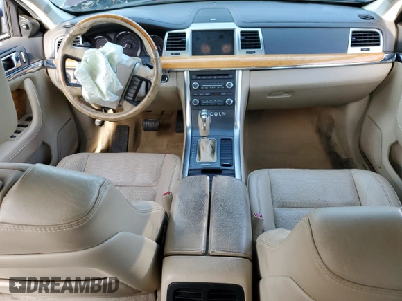 2012 Lincoln MKS with VIN 1LNHL9ERXCG801273, listed as a Copart auction lot 82476574 with 203,370 mi miles and Salvage Title. Bid and sale history available at DreamBid. Image 8.