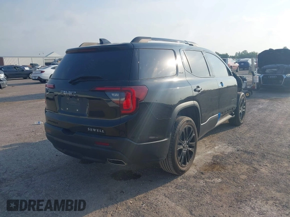 2023 GMC Acadia SLT with VIN 1GKKNMLS8PZ253608, listed as a IAAI auction lot 42264701 with 25,469 mi miles and . Bid and sale history available at DreamBid. Image 4.