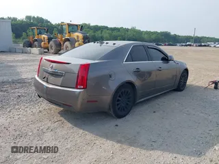 2012 Cadillac CTS Luxury with VIN 1G6DE5E5XC0137961, listed as a IAAI auction lot 42504953 with 179,263 mi miles and . Bid and sale history available at DreamBid. Image 4.