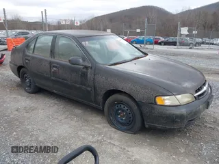 1999 Nissan Altima XE with VIN 1N4DL01DXXC148729, listed as a IAAI auction lot 41697641 with 187,596 mi miles. Bid and sale history available at carsss.com. Image 1.