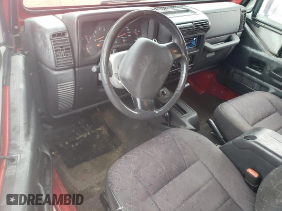 2002 Jeep Wrangler SE with VIN 1J4FA29P02P715013, listed as a Copart auction lot 48039035 with 193,583 mi miles and Salvage Title. Bid and sale history available at DreamBid. Image 8.