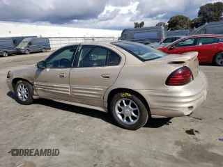 2001 Pontiac Grand Am SE z VIN 1G2NE52T91M583582, wystawiony jako Copart lot #77808974 z przebiegiem 126 219 mil mil oraz Szkoda całkowita • Salvage title. Historia ofert i sprzedaży dostępna na DreamBid. Obrazek 2.