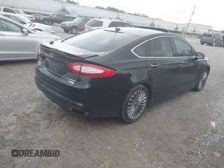 2016 Ford Fusion Titanium with VIN 3FA6P0K97GR118922, listed as a IAAI auction lot 42121212 with 256,584 mi miles and . Bid and sale history available at DreamBid. Image 4.
