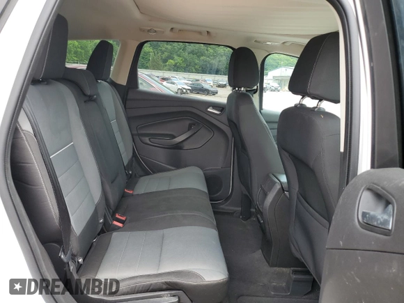 2013 Ford Escape SE with VIN 1FMCU9G9XDUA92061, listed as a Copart auction lot 63074655 with 150,848 mi miles and Salvage title. Bid and sale history available at DreamBid. Image 11.