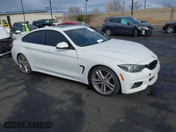 2019 BMW 4 Series 440i with VIN WBA4J5C52KBM65208, listed as a IAAI auction lot 41734154 with 52,477 mi miles and . Bid and sale history available at DreamBid. Image 1.
