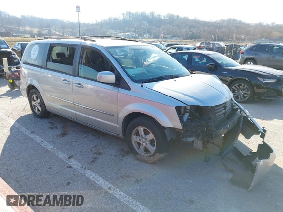 2010 Dodge Grand Caravan SXT with VIN 2D4RN5D17AR154594, listed as a IAAI auction lot 41751767 with Not Provided miles and . Bid and sale history available at DreamBid. Image 1.