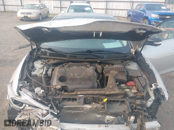 2018 Nissan Maxima SV z VIN 1N4AA6AP1JC366927, wystawiony jako IAAI lot #42394242 z przebiegiem 89 093 mil mil oraz . Historia ofert i sprzedaży dostępna na DreamBid. Obrazek 10.