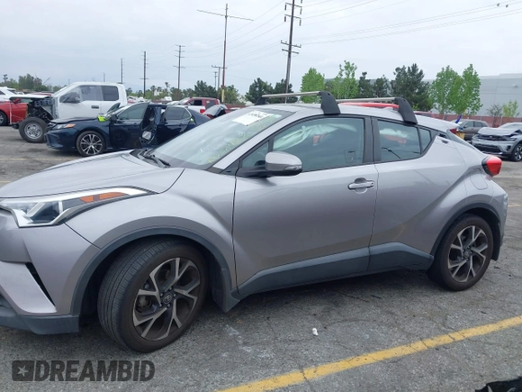 2018 Toyota C-HR XLE with VIN NMTKHMBX8JR032422, listed as a IAAI auction lot 42038240 with 132,553 mi miles and . Bid and sale history available at DreamBid. Image 14.