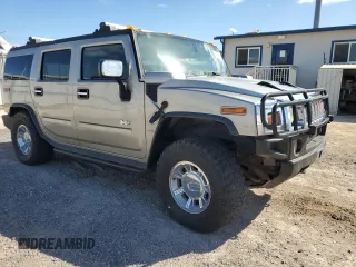 2003 Hummer H2 z VIN 5GRGN23U33H102150, wystawiony jako Copart lot #56997295 z przebiegiem Nie podano mil oraz Tytuł czysty. Historia ofert i sprzedaży dostępna na DreamBid. Obrazek 4.