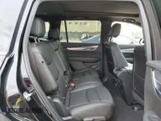 2024 Cadillac XT6 FWD Luxury z VIN 1GYKPAR41RZ734536, wystawiony jako Copart lot #46669655 z przebiegiem 11 916 mil mil oraz Szkoda całkowita • Salvage title. Historia ofert i sprzedaży dostępna na DreamBid. Obrazek 11.
