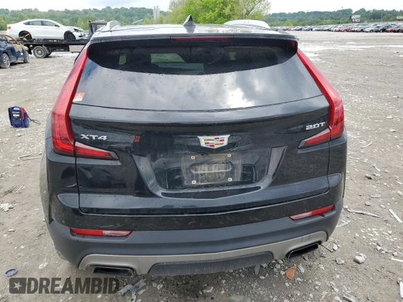 2019 Cadillac XT4 FWD Premium Luxury z VIN 1GYFZCR49KF147242, wystawiony jako Copart lot #55483215 z przebiegiem 94 990 mil mil oraz Szkoda całkowita • Salvage title. Historia ofert i sprzedaży dostępna na DreamBid. Obrazek 6.