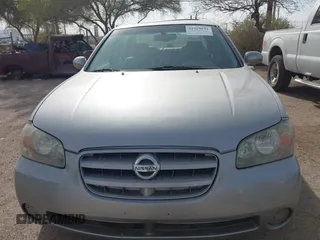 2002 Nissan Maxima GLE z VIN JN1DA31A22T302286, wystawiony jako IAAI lot #41929154 z przebiegiem 249 531 mil mil oraz . Historia ofert i sprzedaży dostępna na DreamBid. Obrazek 12.