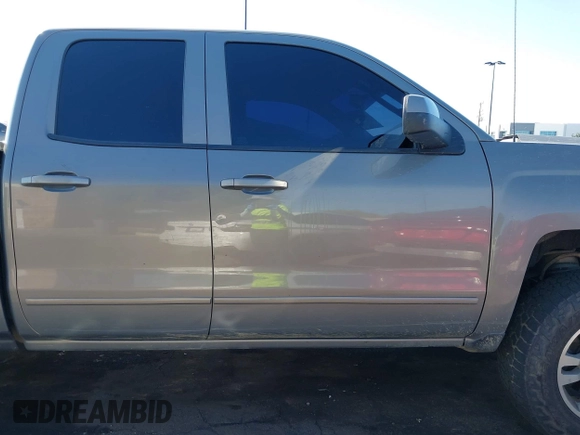 2017 Chevrolet Silverado 1500 LT with VIN 1GCRCRECXHZ159962, listed as a IAAI auction lot 41634689 with 145,978 mi miles and . Bid and sale history available at DreamBid. Image 13.