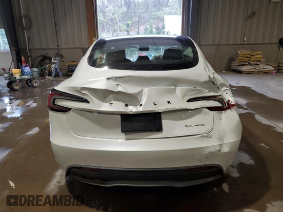 2025 Tesla Model 3 Long Range z VIN 5YJ3E1EBXSF942561, wystawiony jako Copart lot #52961935 z przebiegiem 5 911 mil mil oraz Szkoda całkowita • Salvage title. Historia ofert i sprzedaży dostępna na DreamBid. Obrazek 6.