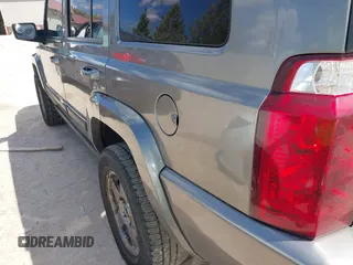 2007 Jeep Commander Sport z VIN 1J8HG48P87C647870, wystawiony jako IAAI lot #42185954 z przebiegiem 269 402 mil mil oraz . Historia ofert i sprzedaży dostępna na DreamBid. Obrazek 15.