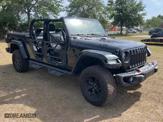 2020 Jeep Gladiator Rubicon with VIN 1C6JJTBG3LL117899, listed as a Copart auction lot 54328235 with 52,674 mi miles and Non Repairable. Bid and sale history available at carsss.com. Image 1.