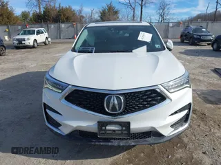 2020 Acura RDX Technology with VIN 5J8TC2H52LL033263, listed as a IAAI auction lot 41293471 with 62,393 mi miles and . Bid and sale history available at DreamBid. Image 12.