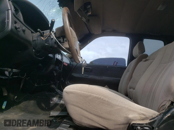 1997 Toyota T100 SR5 with VIN JT4UN24D9V0050303, listed as a Copart auction lot 68910134 with 281,477 mi miles and Salvage Title. Bid and sale history available at DreamBid. Image 7.