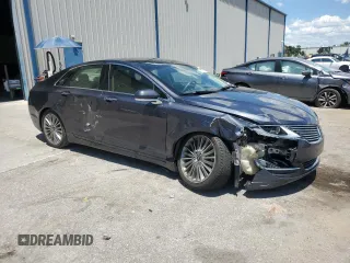 2013 Lincoln MKZ z VIN 3LN6L2GK4DR817557, wystawiony jako Copart lot #60876995 z przebiegiem 77 303 mil mil oraz Szkoda całkowita • Salvage title. Historia ofert i sprzedaży dostępna na DreamBid. Obrazek 4.