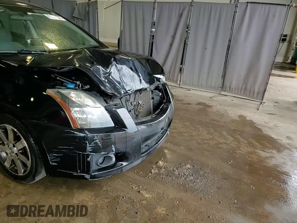2012 Nissan Sentra S with VIN 3N1AB6AP4CL778342, listed as a Copart auction lot 61245325 with 106,623 mi miles and Salvage title. Bid and sale history available at DreamBid. Image 13.