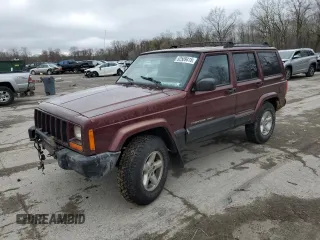 2000 Jeep Cherokee z VIN 1J4FF48S0YL254270, wystawiony jako Copart lot #52589415 z przebiegiem 166 860 mil mil oraz Szkody całkowita. Historia ofert i sprzedaży dostępna na DreamBid. Obrazek 1.