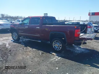 2016 GMC Sierra 2500HD Denali z VIN 1GT12UE87GF287056, wystawiony jako IAAI lot #41753772 z przebiegiem 284 546 mil mil oraz . Historia ofert i sprzedaży dostępna na DreamBid. Obrazek 3.