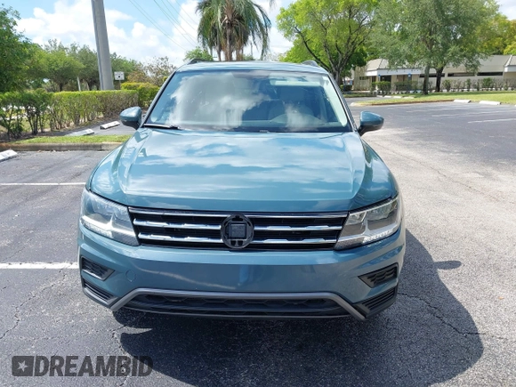 2019 Volkswagen Tiguan SE with VIN 3VV3B7AX8KM171057, listed as a IAAI auction lot 42209509 with 99,437 mi miles and . Bid and sale history available at DreamBid. Image 12.