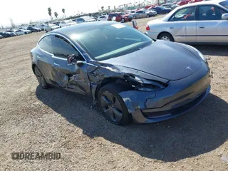 2020 Tesla Model 3 Standard Range Plus with VIN 5YJ3E1EA5LF644282, listed as a IAAI auction lot 41710124 with 69,969 mi miles and . Bid and sale history available at DreamBid. Image 1.