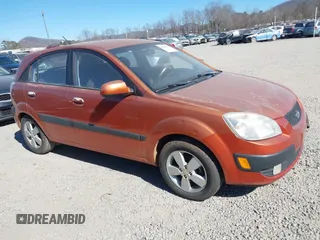 2008 Kia Rio LX with VIN KNADE163X86326307, listed as a IAAI auction lot 41680984 with 135,935 mi miles. Bid and sale history available at carsss.com. Image 1.