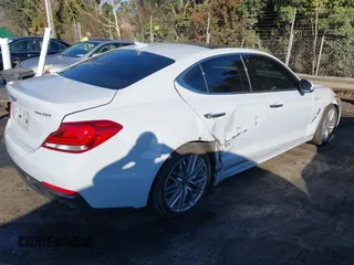 2021 Genesis G70 2.0T with VIN KMTG34LA6MU075190, listed as a IAAI auction lot 41474675 with 72,743 mi miles and . Bid and sale history available at DreamBid. Image 4.