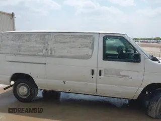 2012 Ford Econoline Cargo Recreational with VIN 1FTNE2EW2CDA43588, listed as a IAAI auction lot 41939220 with 246,855 mi miles. Bid and sale history available at carsss.com. Image 13.