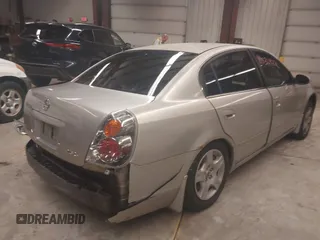 2004 Nissan Altima S with VIN 1N4AL11D14C119642, listed as a IAAI auction lot 41530422 with 98,613 mi miles. Bid and sale history available at carsss.com. Image 4.