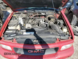 1997 GMC Sonoma SLS with VIN 1GTCS19XXVK506122, listed as a Copart auction lot 82875544 with 148,914 mi miles and Salvage Title. Bid and sale history available at carsss.com. Image 11.