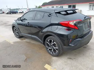 2019 Toyota C-HR XLE with VIN NMTKHMBX2KR094898, listed as a IAAI auction lot 41940883 with 94,351 mi miles. Bid and sale history available at carsss.com. Image 3.