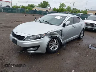 2013 Kia Optima LX z VIN KNAGM4A75D5431221, wystawiony jako IAAI lot #42244970 z przebiegiem 138 157 mil mil oraz . Historia ofert i sprzedaży dostępna na DreamBid. Obrazek 19.