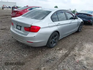 2014 BMW 3 Series 328d with VIN WBA3D3C58EK154748, listed as a IAAI auction lot 42598778 with 196,158 mi miles and . Bid and sale history available at DreamBid. Image 4.