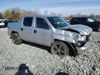 2013 Honda Ridgeline Sport z VIN 5FPYK1F70DB018035, wystawiony jako Copart lot #50519355 z przebiegiem Nie podano mil oraz Szkody całkowita. Historia ofert i sprzedaży dostępna na DreamBid. Obrazek 4.
