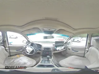 2004 Jeep Grand Cherokee Laredo with VIN 1J4GX48SX4C201569, listed as a Copart auction lot 58631585 with 271,124 mi miles and Salvage title. Bid and sale history available at DreamBid. Image 16.