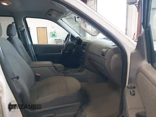2004 Ford Explorer XLS z VIN 1FMZU72K84UB18388, wystawiony jako IAAI lot #42066508 z przebiegiem 163 416 mil mil oraz . Historia ofert i sprzedaży dostępna na DreamBid. Obrazek 5.