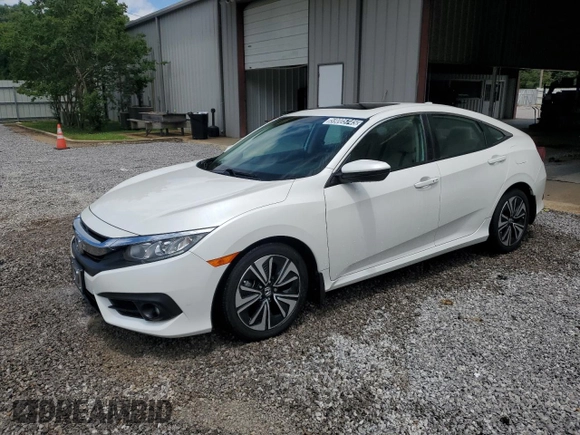 2017 Honda Civic EX-L z VIN 19XFC1F74HE014241, wystawiony jako Copart lot #59005745 z przebiegiem 55 629 mil mil oraz Czysty tytuł • Clean title. Historia ofert i sprzedaży dostępna na DreamBid. Obrazek 1.
