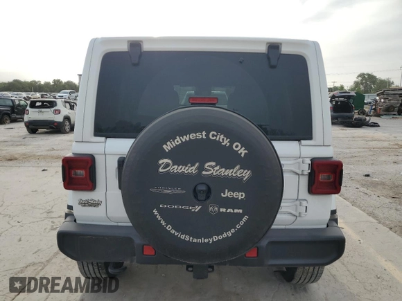 2024 Jeep Wrangler Sahara z VIN 1C4PJXEG8RW264328, wystawiony jako Copart lot #57106615 z przebiegiem 14 890 mil mil oraz Szkoda całkowita • Salvage title. Historia ofert i sprzedaży dostępna na DreamBid. Obrazek 6.