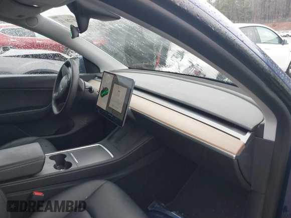 2021 Tesla Model Y Performance with VIN 5YJYGDEF5MF257262, listed as a IAAI auction lot 41721311 with 31,329 mi miles and . Bid and sale history available at DreamBid. Image 5.