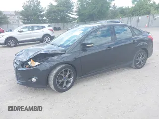 2013 Ford Focus SE z VIN 1FADP3F2XDL354156, wystawiony jako IAAI lot #42231744 z przebiegiem 123 518 mil mil oraz . Historia ofert i sprzedaży dostępna na DreamBid. Obrazek 2.