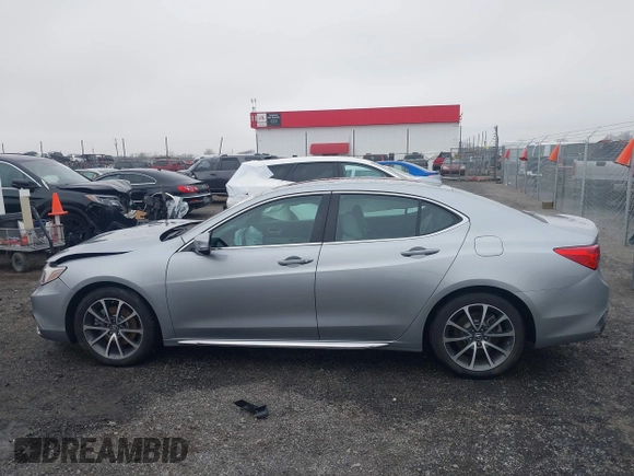 2018 Acura TLX Technology z VIN 19UUB2F52JA001206, wystawiony jako IAAI lot #41498575 z przebiegiem 83 823 mil mil oraz . Historia ofert i sprzedaży dostępna na DreamBid. Obrazek 14.