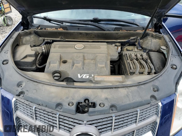 2012 Cadillac SRX Performance Collection with VIN 3GYFNBE35CS579214, listed as a Copart auction lot 54725465 with 114,829 mi miles and Salvage title. Bid and sale history available at DreamBid. Image 12.