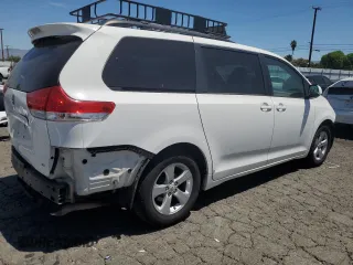 2012 Toyota Sienna LE AAS with VIN 5TDKK3DC4CS217089, listed as a Copart auction lot 64078095 with 266,382 mi miles and Salvage title. Bid and sale history available at DreamBid. Image 3.
