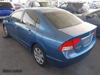 2010 Honda Civic Sdn LX with VIN 2HGFA1F50AH581076, listed as a IAAI auction lot 41945819 with 154,636 mi miles. Bid and sale history available at carsss.com. Image 3.