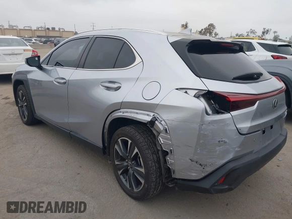 2023 Lexus UX 250h with VIN JTHX6JBH6P2143926, listed as a IAAI auction lot 42180779 with 65,106 mi miles and . Bid and sale history available at DreamBid. Image 3.