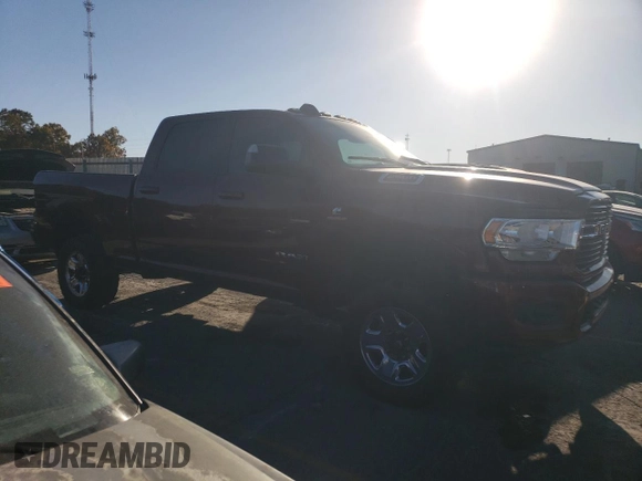 2021 Ram 2500 Big Horn with VIN 3C6UR5DL1MG581624, listed as a Copart auction lot 79247974 with 50,828 mi miles and Salvage title. Bid and sale history available at DreamBid. Image 4.
